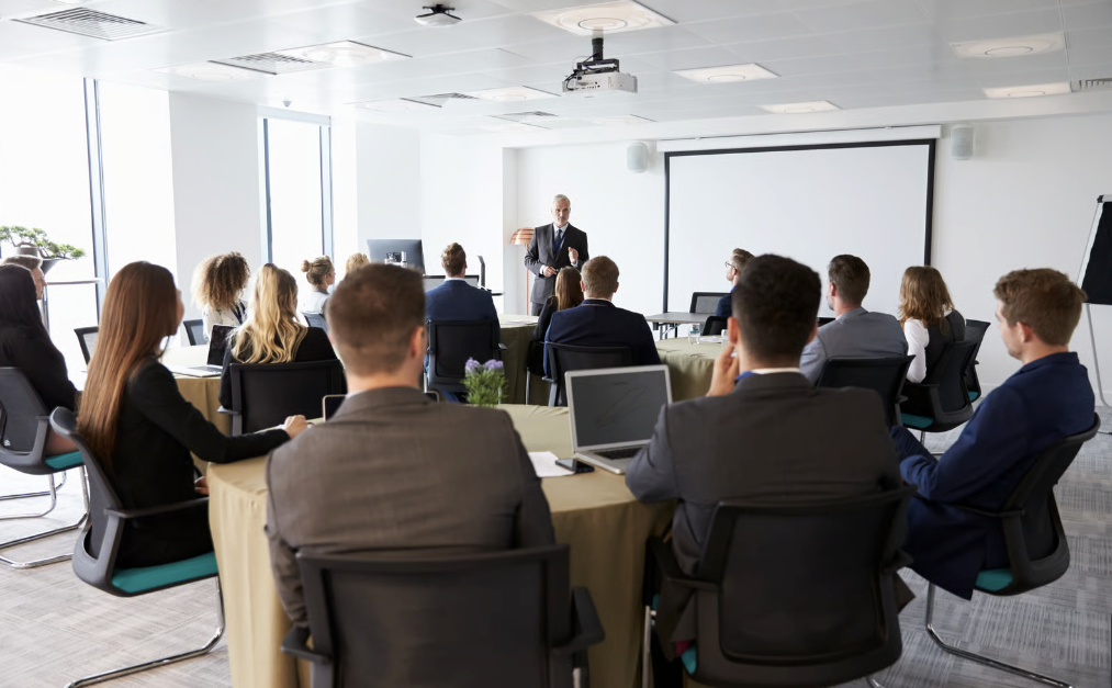 Professionals participating in a classroom training session